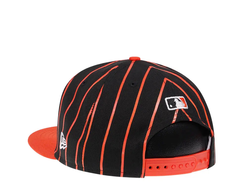 Gorra snapback New Era 9FIFTY de los San Francisco Giants con arco de la ciudad en negro/naranja