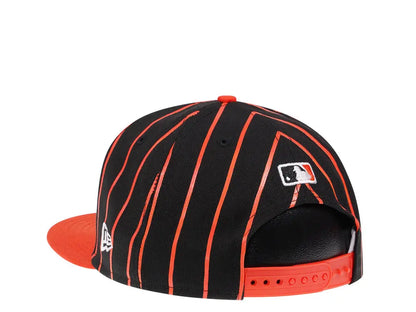 Gorra snapback New Era 9FIFTY de los San Francisco Giants con arco de la ciudad en negro/naranja